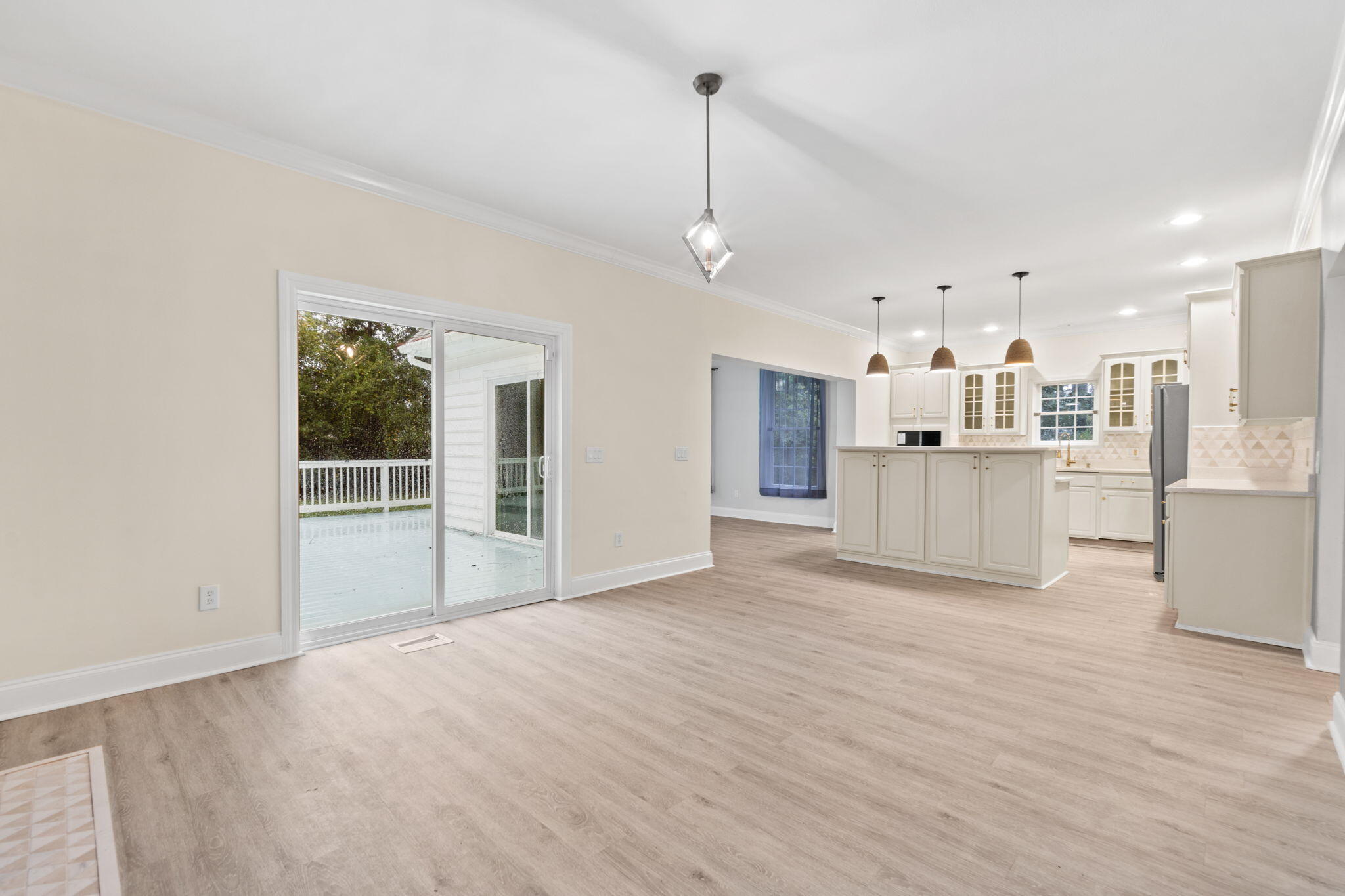 117 Santa Barbara Avenue Santa Rosa Beach, FL 32459 - Photo 12 of 116 a view of a kitchen with furniture and wooden floor