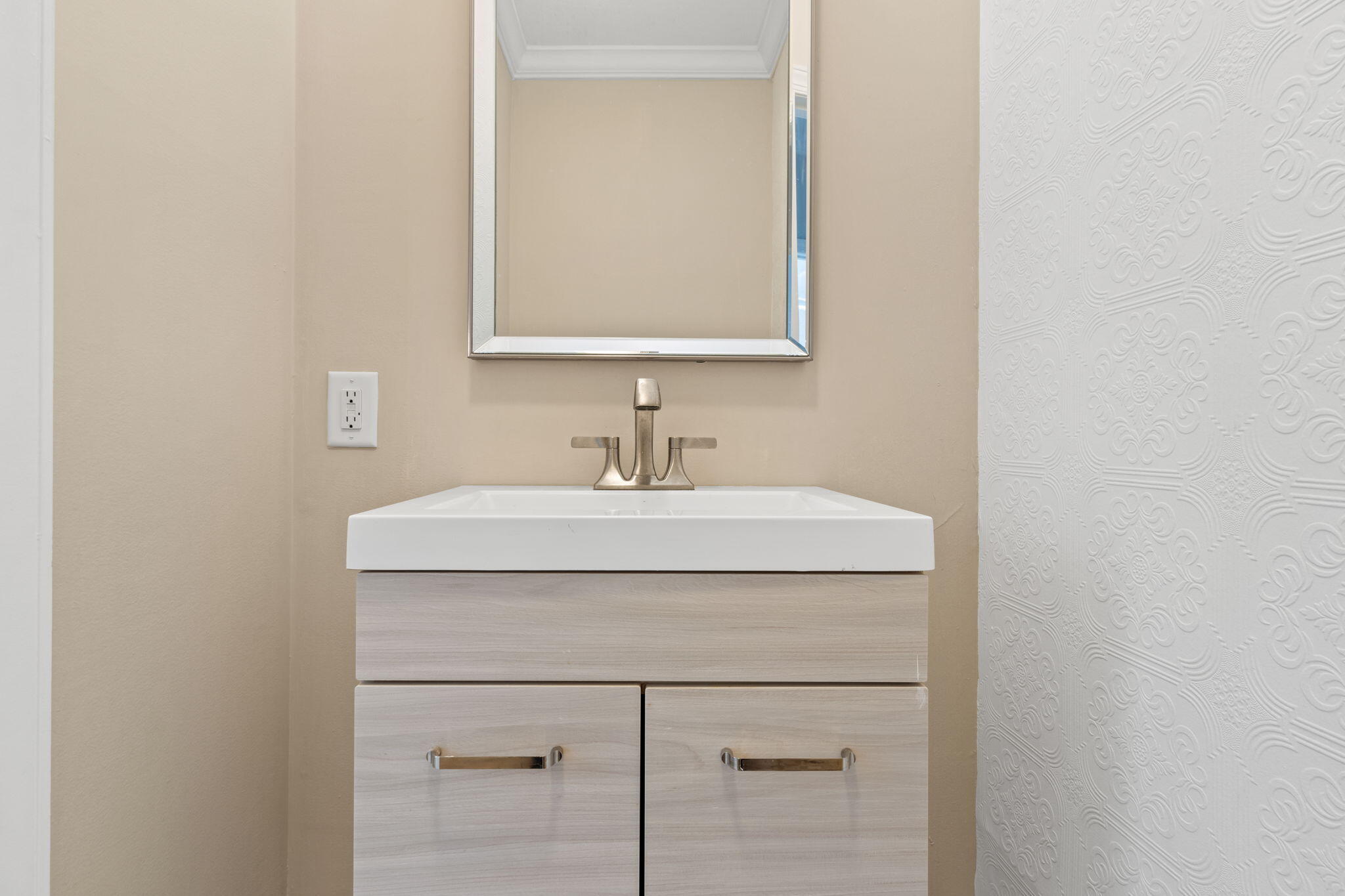 117 Santa Barbara Avenue Santa Rosa Beach, FL 32459 - Photo 18 of 116 a bathroom with a sink and a mirror