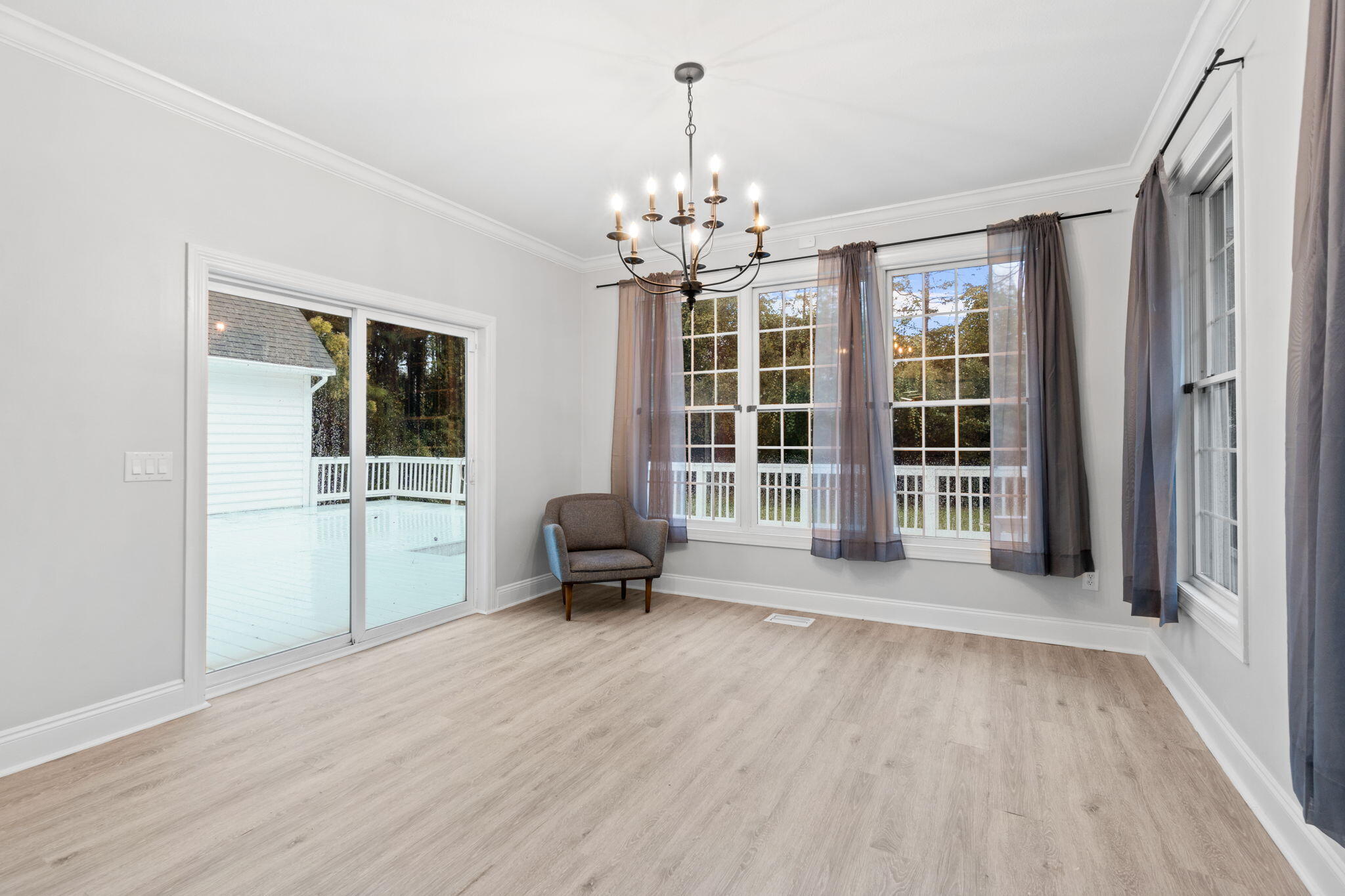 117 Santa Barbara Avenue Santa Rosa Beach, FL 32459 - Photo 22 of 116 a view of a livingroom with wooden floor and a window