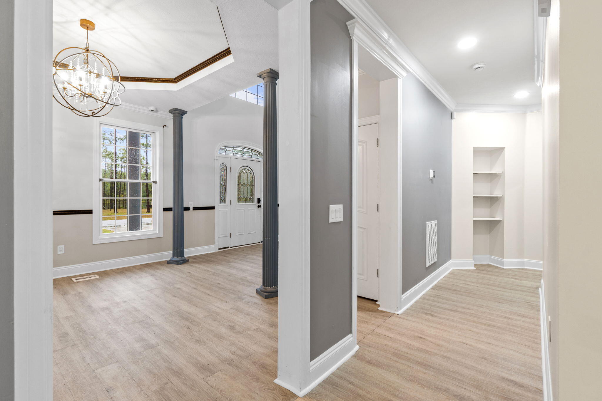 117 Santa Barbara Avenue Santa Rosa Beach, FL 32459 - Photo 26 of 116 a view of an empty room with wooden floor and a window