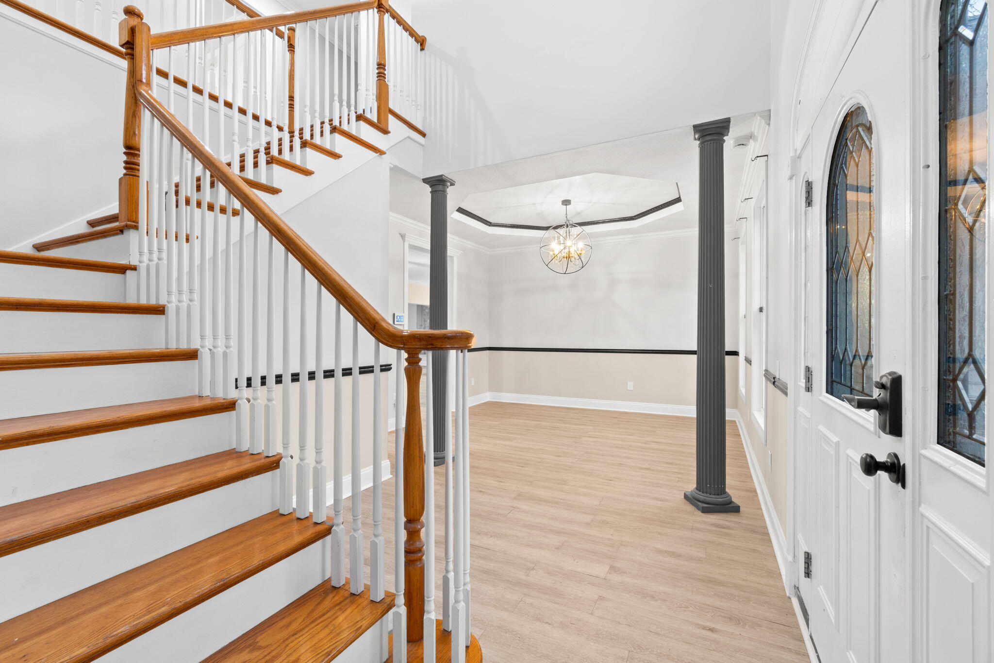 117 Santa Barbara Avenue Santa Rosa Beach, FL 32459 - Photo 5 of 116 a view of entryway with wooden floor and stairs