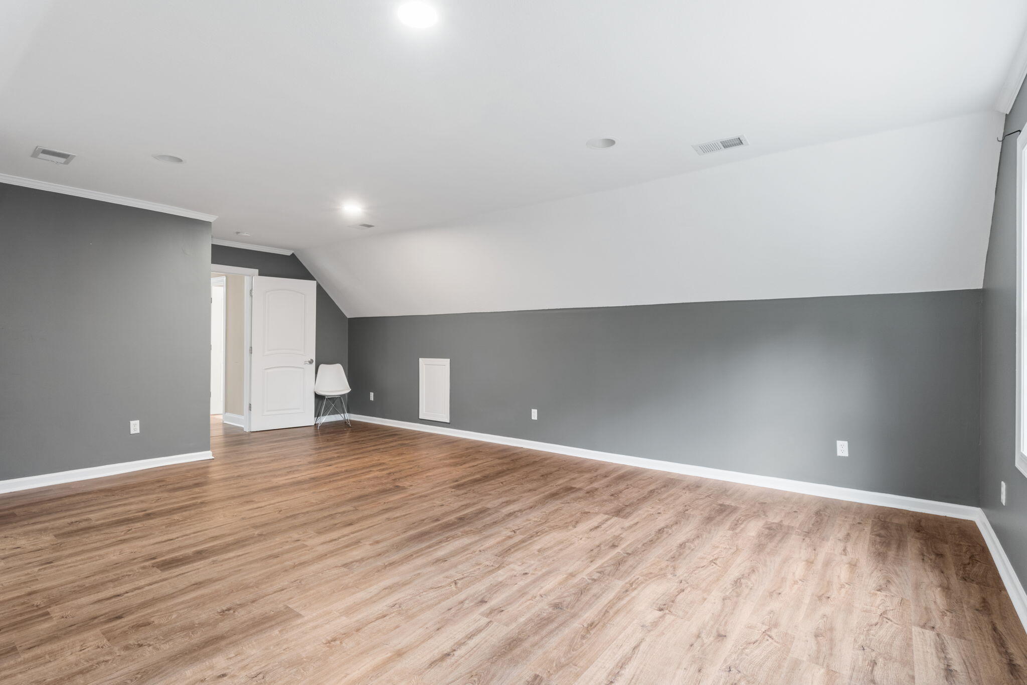 117 Santa Barbara Avenue Santa Rosa Beach, FL 32459 - Photo 53 of 116 a view of an empty room with wooden floor