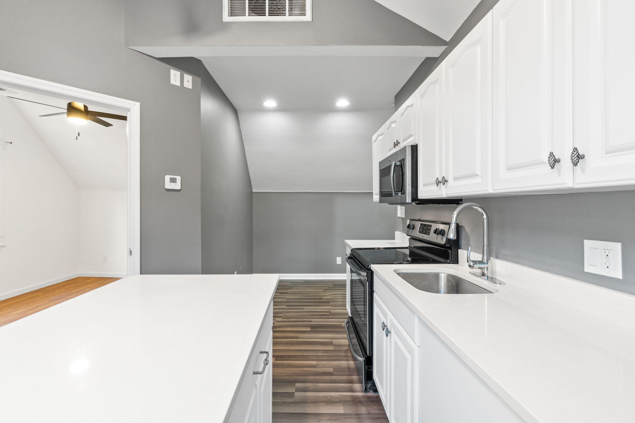 117 Santa Barbara Avenue Santa Rosa Beach, FL 32459 - Photo 60 of 116 a kitchen with a sink a stove and refrigerator