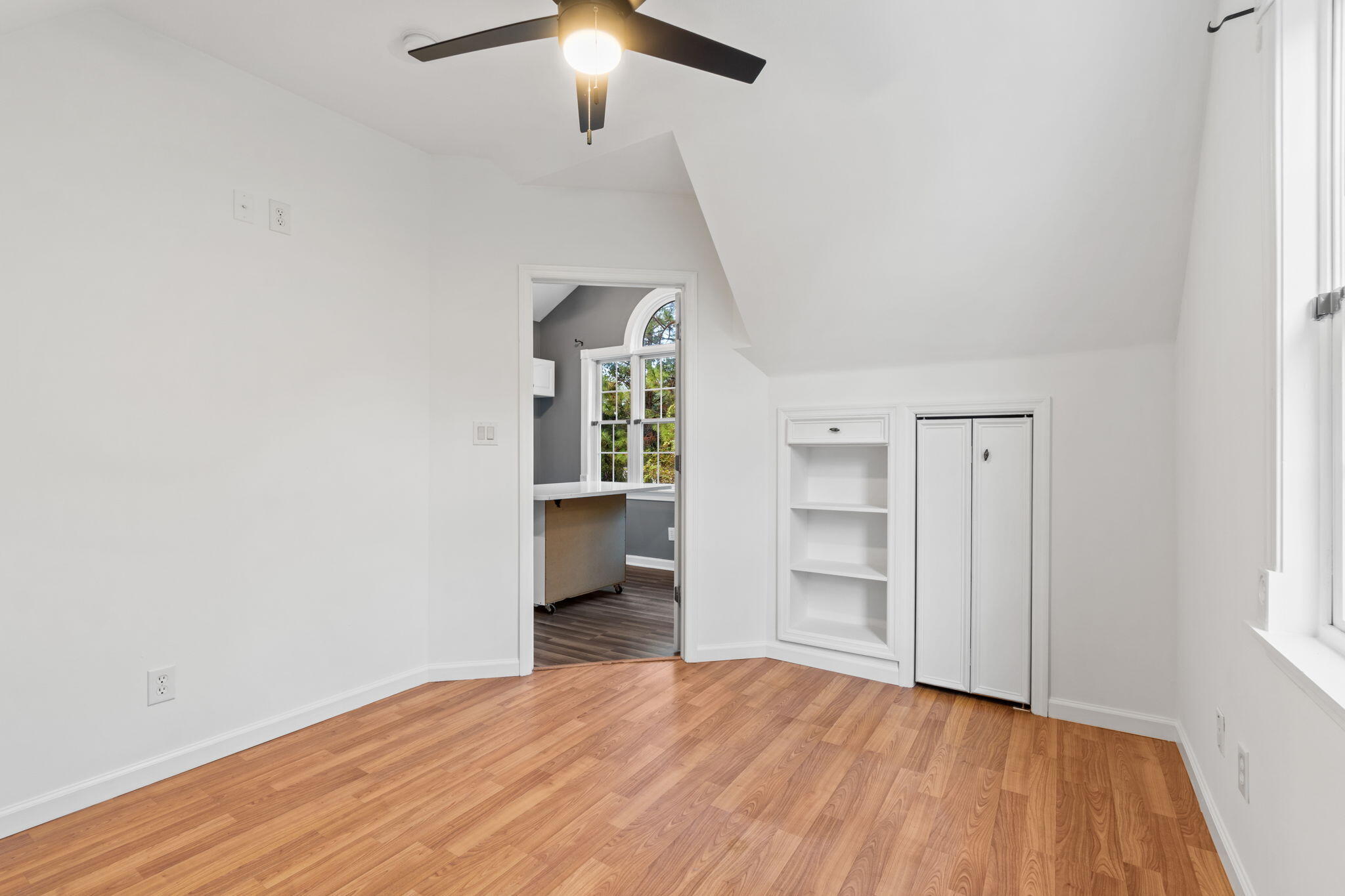 117 Santa Barbara Avenue Santa Rosa Beach, FL 32459 - Photo 64 of 116 a view of empty room with wooden floor and window