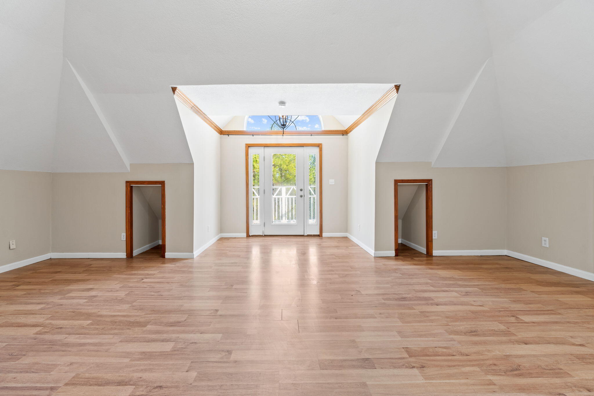 117 Santa Barbara Avenue Santa Rosa Beach, FL 32459 - Photo 76 of 116 a view of an empty room with a window and wooden floor
