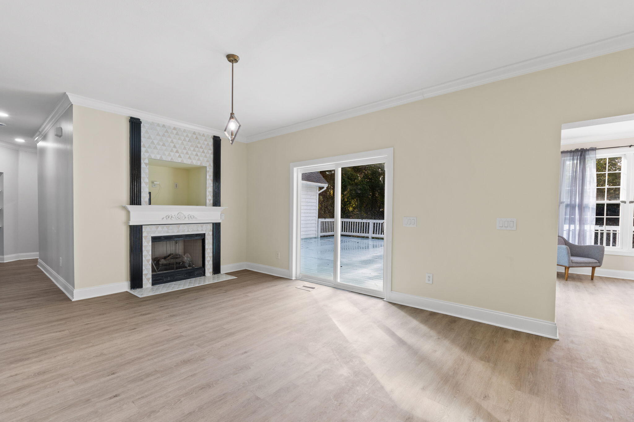 117 Santa Barbara Avenue Santa Rosa Beach, FL 32459 - Photo 81 of 116 wooden floor fireplace and windows in an empty room
