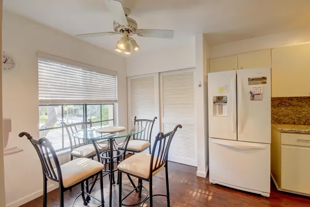 a kitchen with a sink stove and microwave