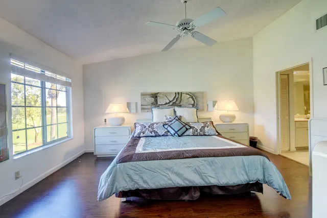 a bathroom with a shower and toilet