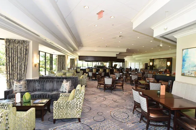 a view of a golf course with a lake view