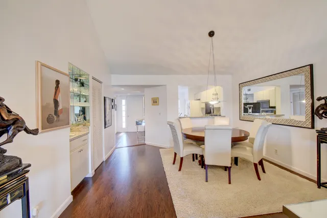 a kitchen with a sink stove and refrigerator