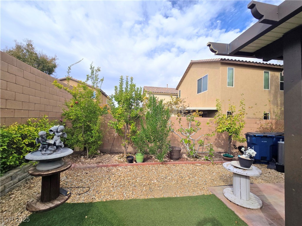 10855 Casco Bay Street Las Vegas, NV 89179 - Photo 50 of 64 Fenced backyard with a patio area