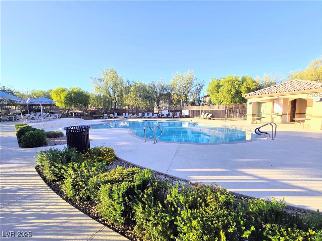 10855 Casco Bay Street Las Vegas, NV 89179 - Photo 62 of 64 Community pool with a patio area