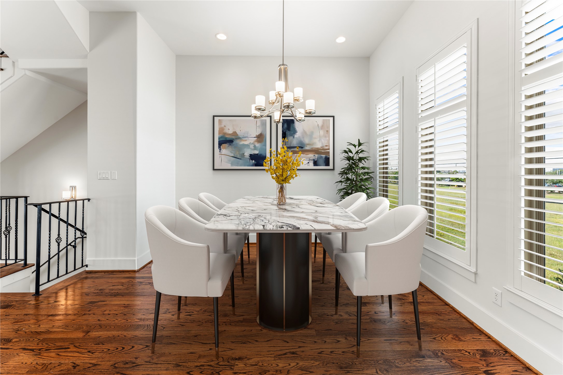 4938 Edison Park Lane Houston, TX 77081 - Photo 11 of 49 a view of a dining room with furniture window and wooden floor