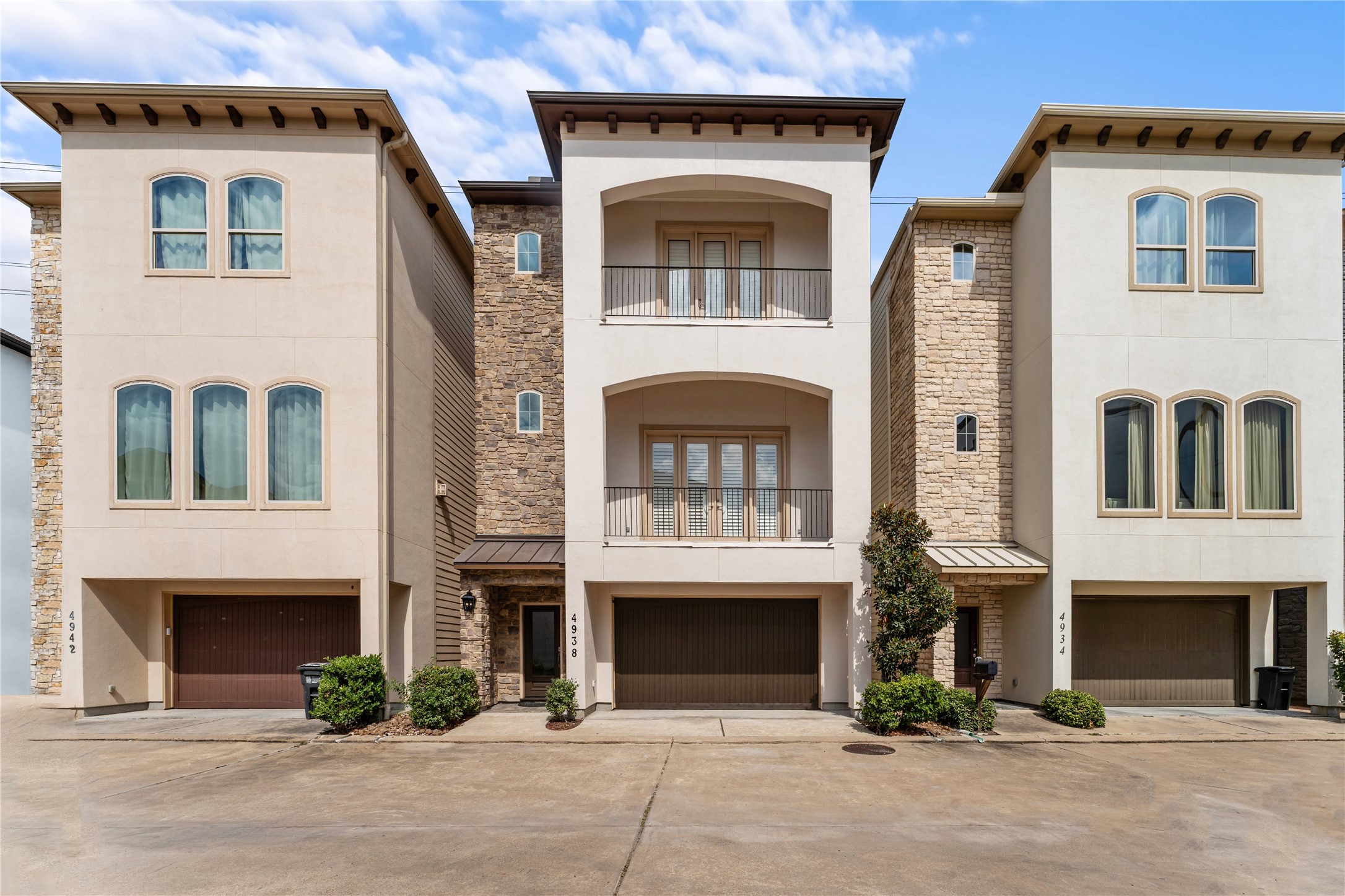 4938 Edison Park Lane Houston, TX 77081 - Photo 2 of 49 a front view of a house with yard