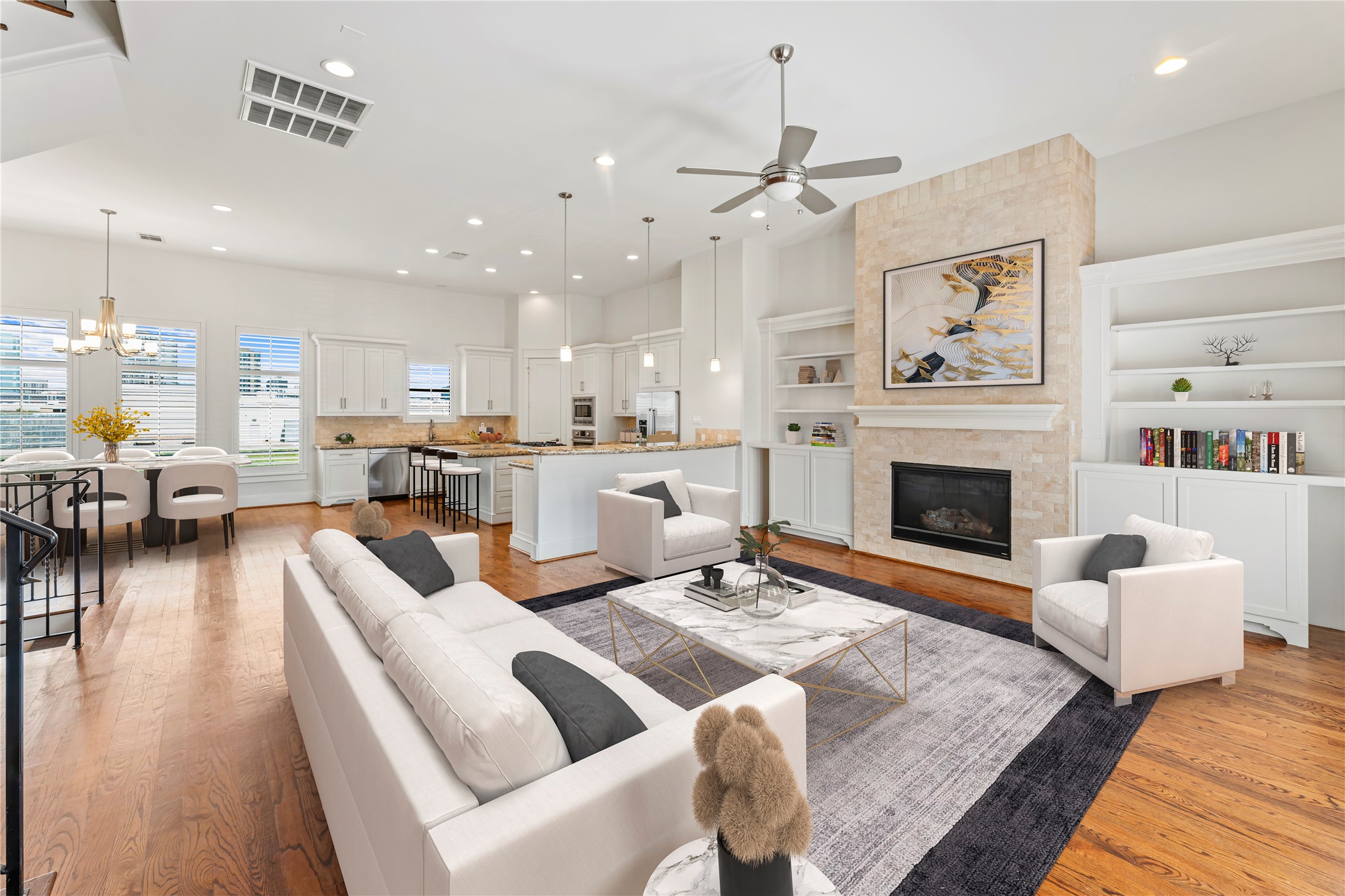 4938 Edison Park Lane Houston, TX 77081 - Photo 22 of 49 a living room with furniture fireplace and kitchen view