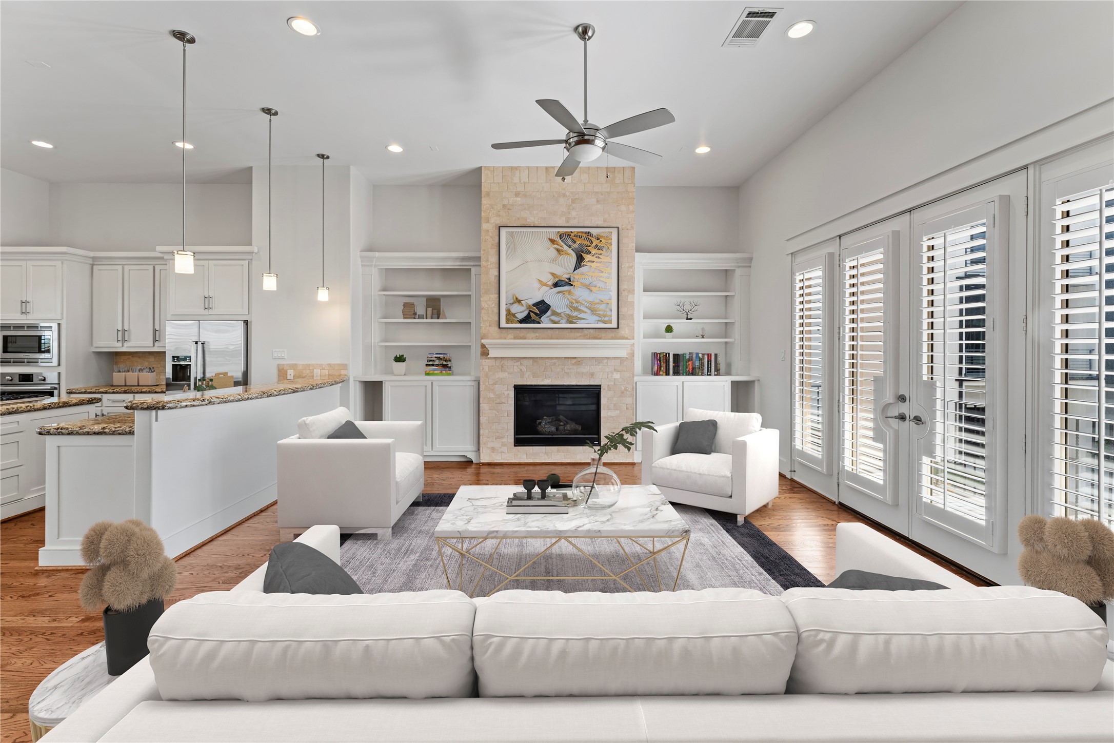 4938 Edison Park Lane Houston, TX 77081 - Photo 23 of 49 a living room with furniture kitchen view and a fireplace