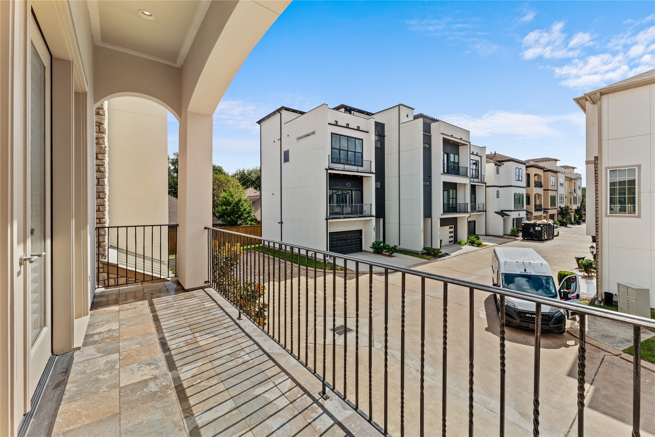 4938 Edison Park Lane Houston, TX 77081 - Photo 30 of 49 a view of a brick house with wooden fence