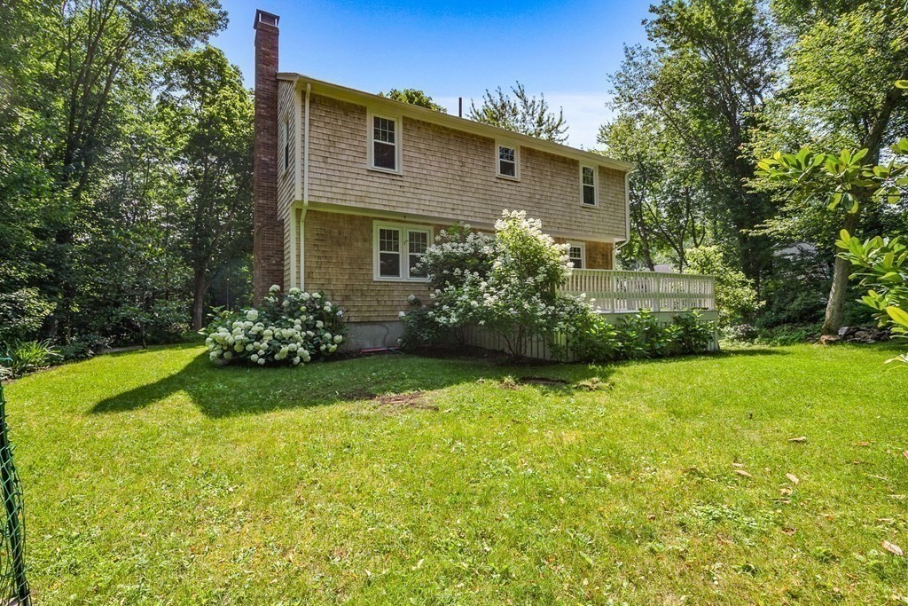 3 Chatham Circle Hingham, MA 02043 - Photo 13 of 36 a front view of a house with garden