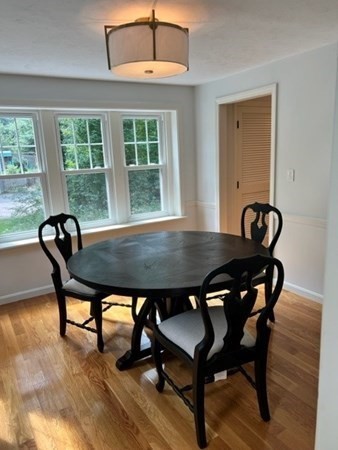 3 Chatham Circle Hingham, MA 02043 - Photo 19 of 36 a view of a dining room with furniture wooden floor and chandelier