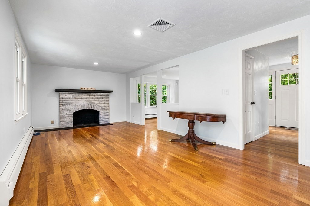3 Chatham Circle Hingham, MA 02043 - Photo 27 of 36 a living room with furniture and a fireplace