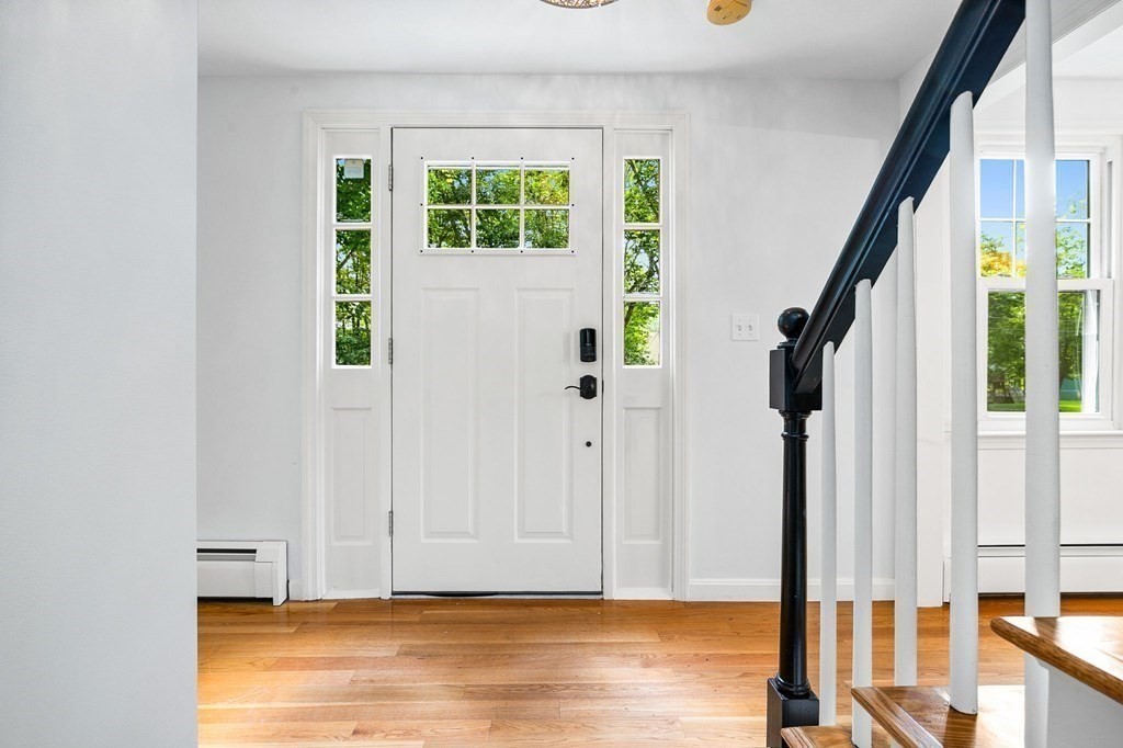 3 Chatham Circle Hingham, MA 02043 - Photo 28 of 36 a view of entryway with wooden floor and stairs
