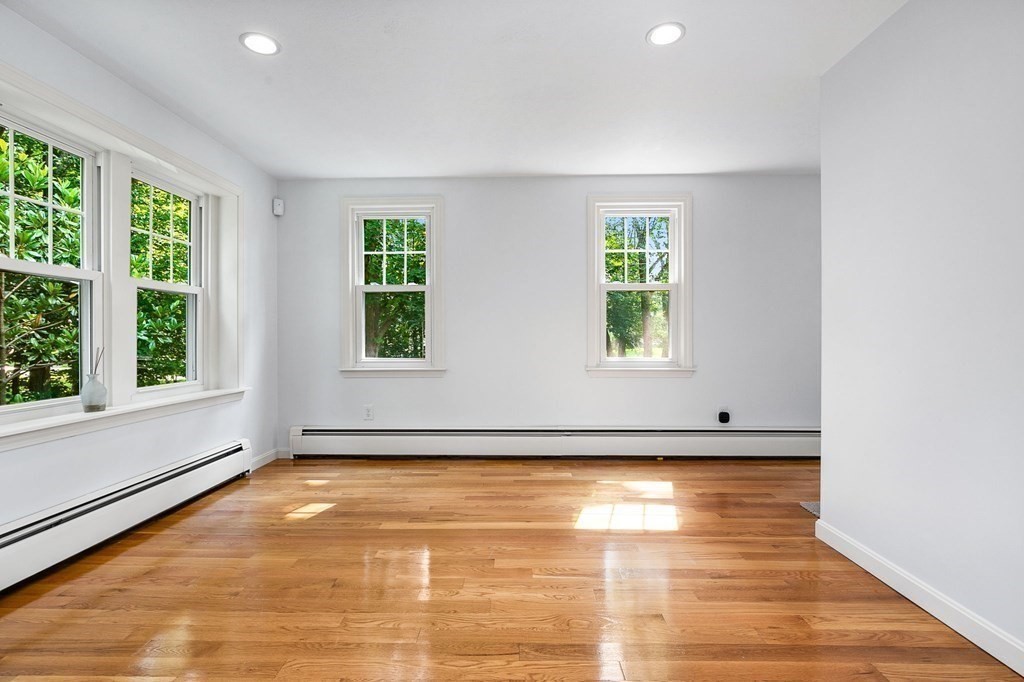 3 Chatham Circle Hingham, MA 02043 - Photo 30 of 36 a view of an empty room with wooden floor and a window