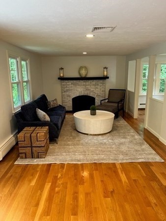 3 Chatham Circle Hingham, MA 02043 - Photo 3 of 36 a living room with furniture and a fireplace