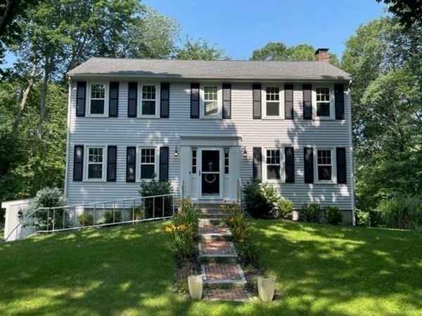 3 Chatham Circle Hingham, MA 02043 - Photo 5 of 36 a front view of a house with a yard