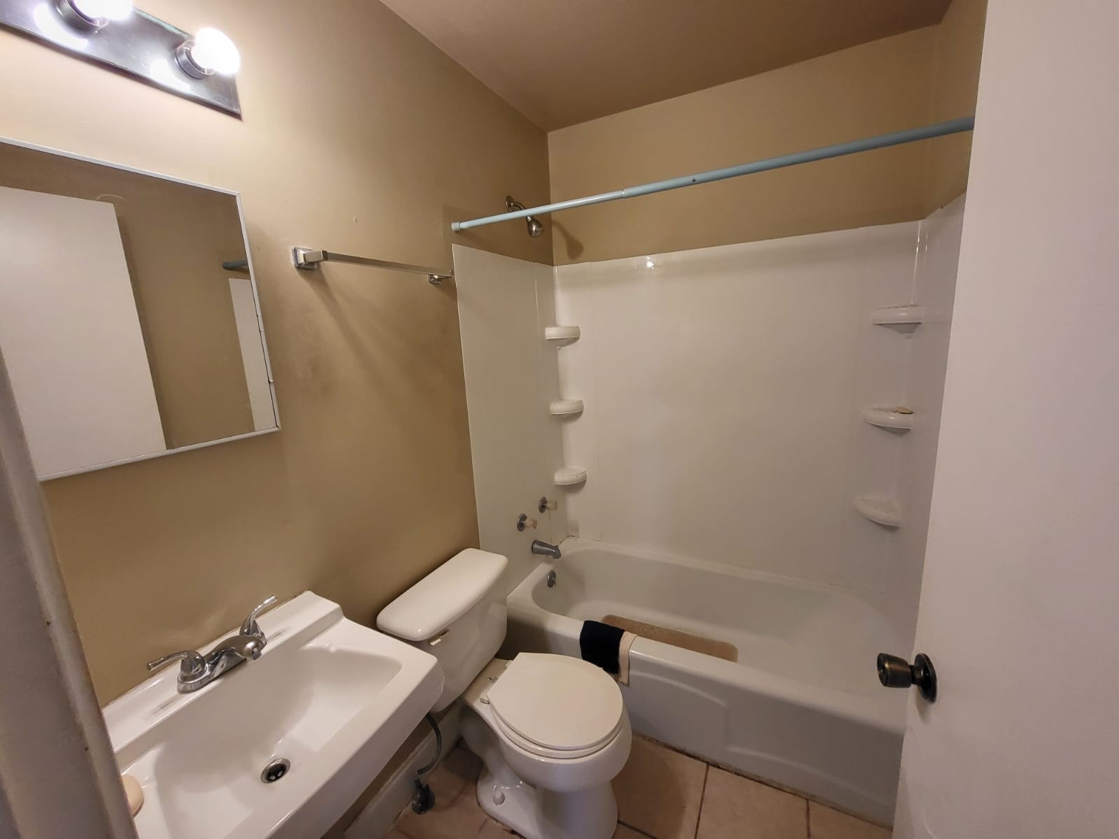 721 9th Street Clarksville, TN 37040 - Photo 7 of 7 a bathroom with a sink toilet and shower