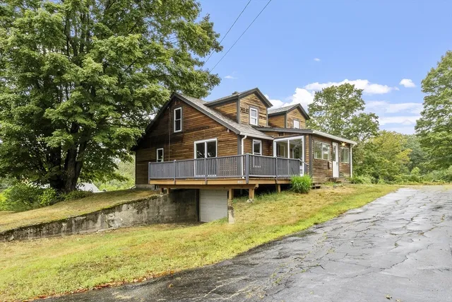a view of a house with a swimming pool