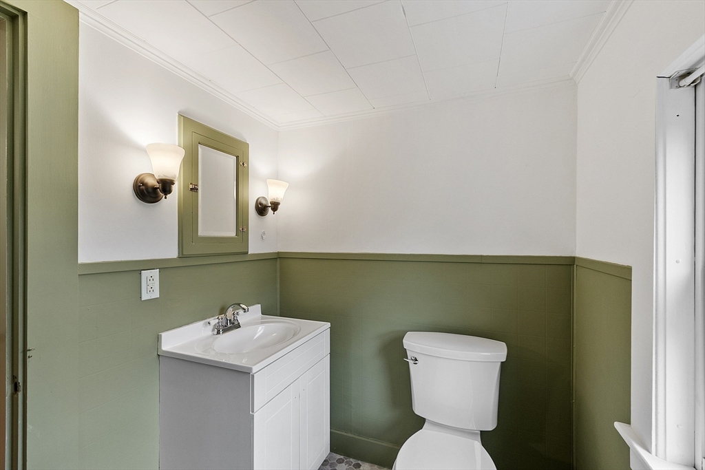 175 Petersham Road Phillipston, MA 01331 - Photo 21 of 42 a bathroom with a toilet sink and mirror