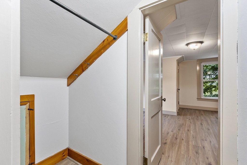175 Petersham Road Phillipston, MA 01331 - Photo 26 of 42 a view of a hallway with wooden floor and staircase