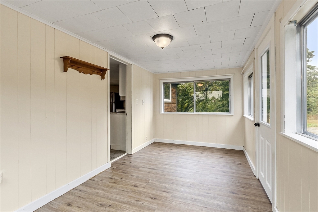 175 Petersham Road Phillipston, MA 01331 - Photo 28 of 42 a view of an empty room with wooden floor and a window
