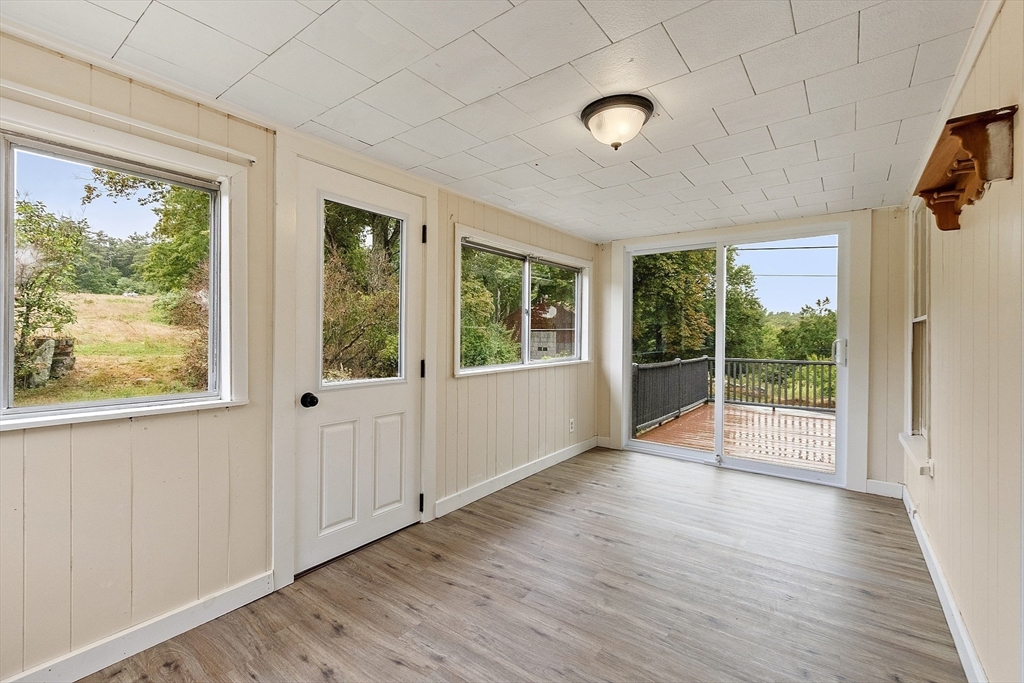 175 Petersham Road Phillipston, MA 01331 - Photo 29 of 42 a view of an empty room with wooden floor and a window