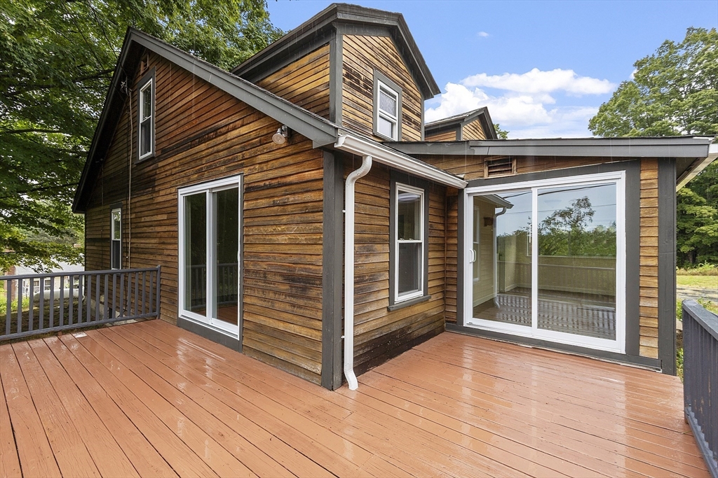 175 Petersham Road Phillipston, MA 01331 - Photo 37 of 42 a view of wooden house and a large window