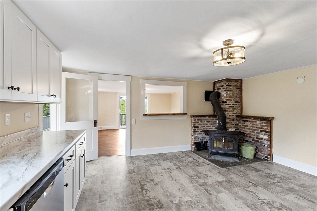 175 Petersham Road Phillipston, MA 01331 - Photo 7 of 42 a kitchen with a refrigerator and a sink