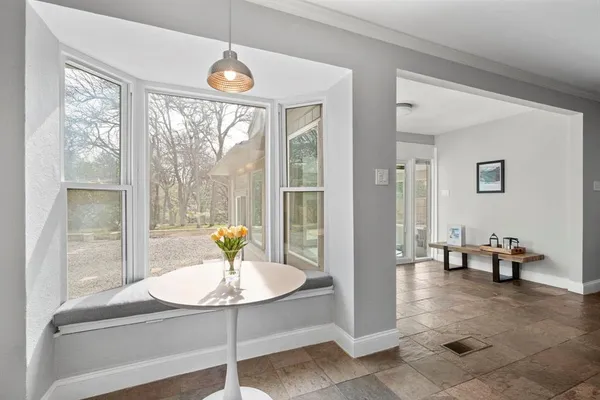a living room with furniture and a table