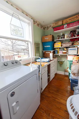 a kitchen with stainless steel appliances a sink and a stove