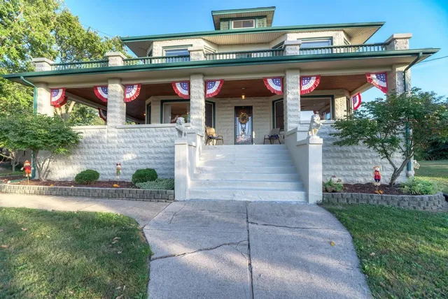 a view of a chairs and table in the patio