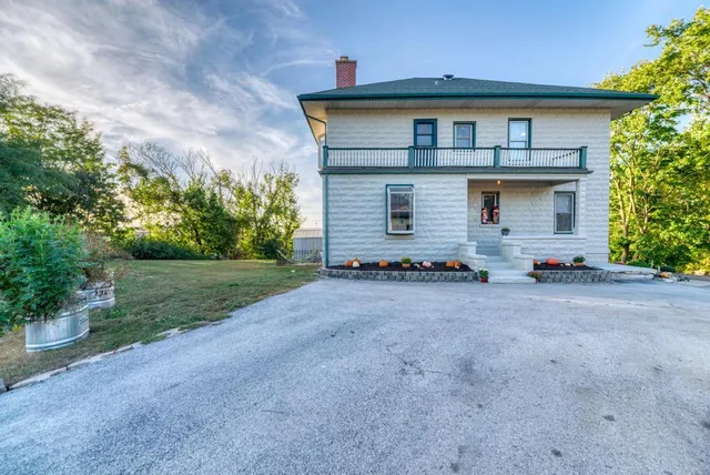 a front view of house with yard