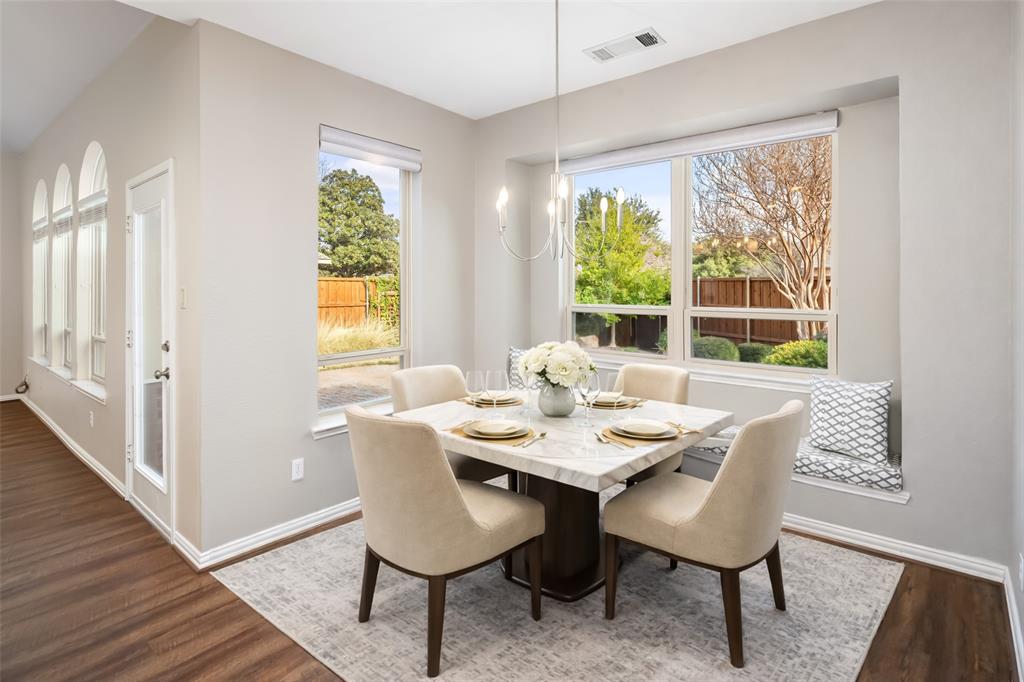 103 Sierra Court Allen, TX 75013 - Photo 8 of 28 a dining room with furniture a rug and wooden floor
