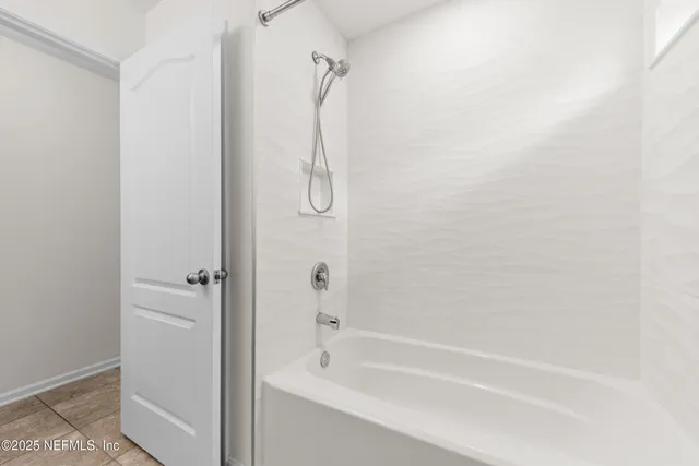 a bathroom with a bathtub