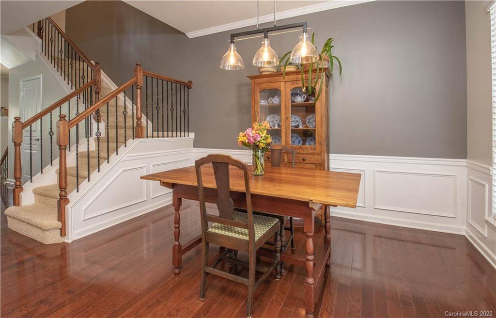 903 Lyndley Drive Fort Mill, SC 29708 - Photo 14 of 47 a view of a dining room with furniture and wooden floor