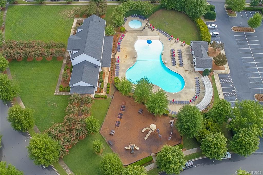 903 Lyndley Drive Fort Mill, SC 29708 - Photo 38 of 47 an aerial view of a house with a garden and lake view