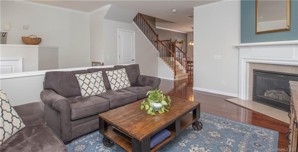 903 Lyndley Drive Fort Mill, SC 29708 - Photo 6 of 47 a living room with furniture and a fireplace