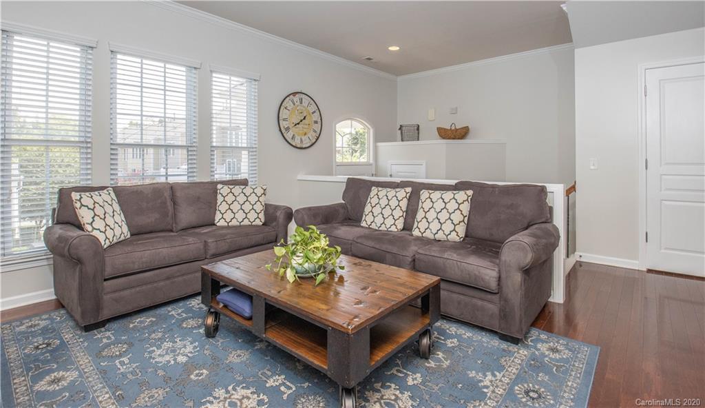 903 Lyndley Drive Fort Mill, SC 29708 - Photo 8 of 47 a living room with furniture and a large window
