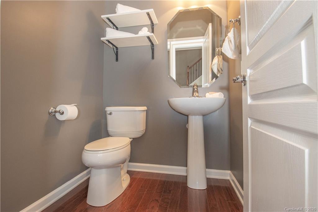 903 Lyndley Drive Fort Mill, SC 29708 - Photo 9 of 47 a bathroom with a toilet sink and mirror
