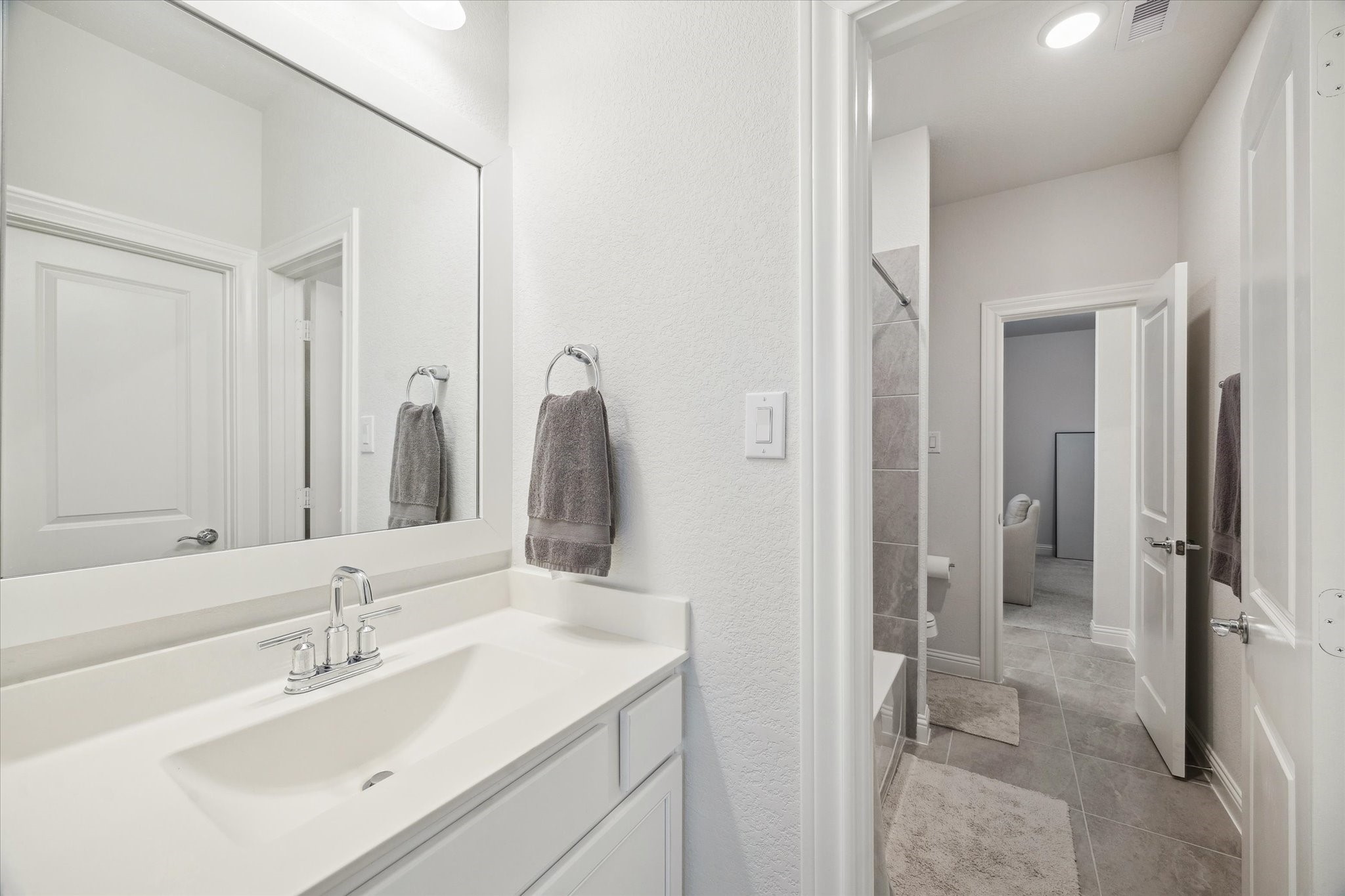 28227 Whitmore Bend Drive Spring, TX 77386 - Photo 30 of 36 The Hollywood bath offers 2 separate vanity areas and a convenient tub/shower combo for shared use.