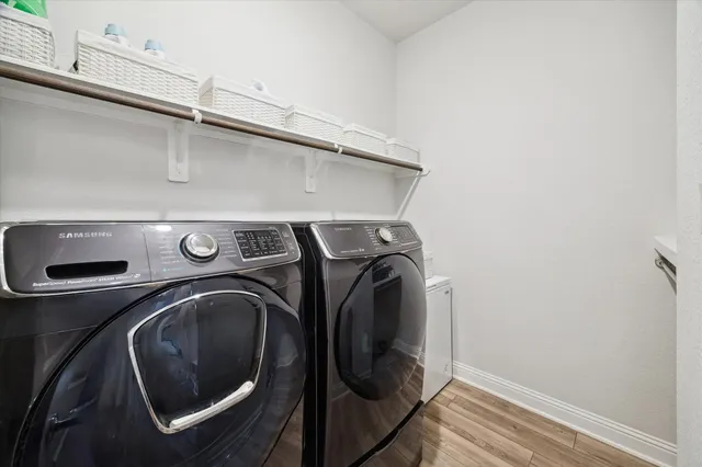 a view of a house with backyard and porch
