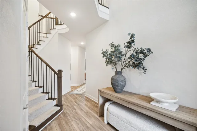 a view of entryway with wooden floor